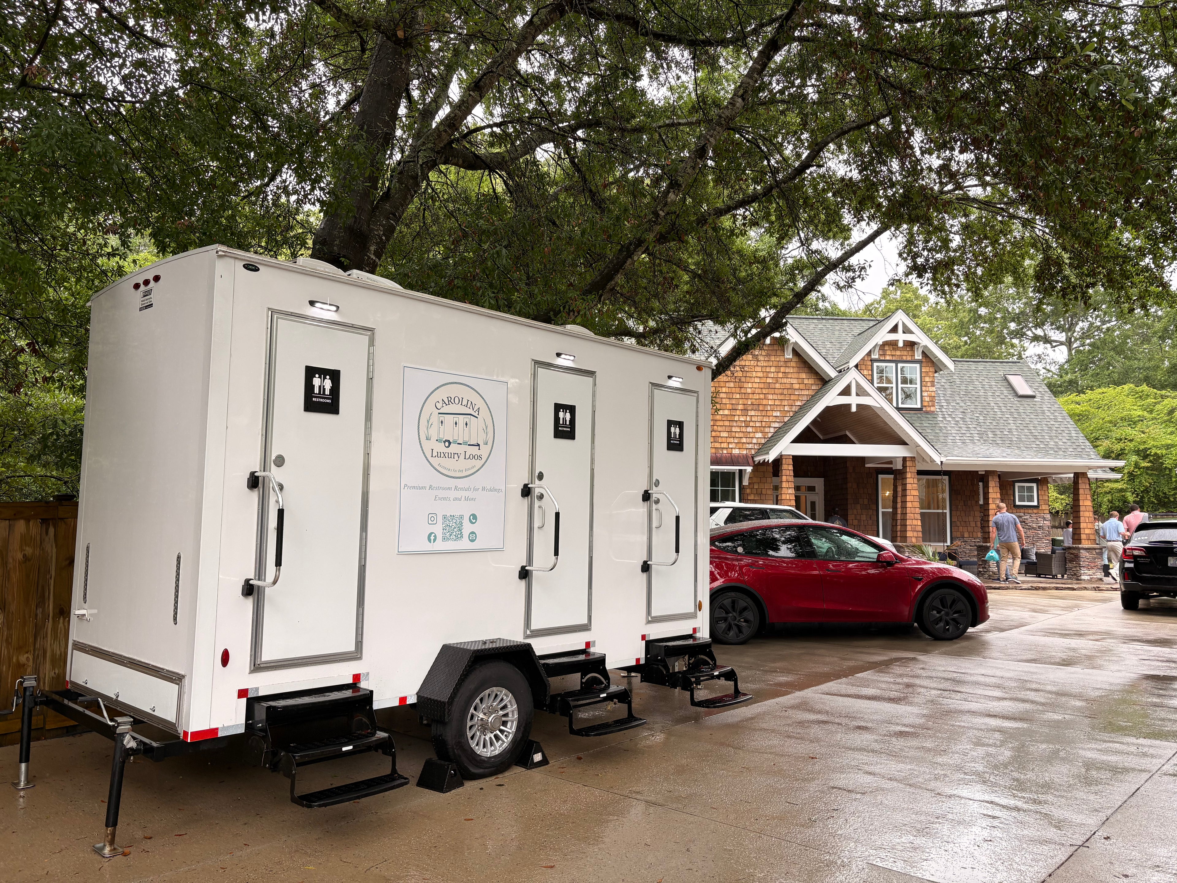 Carolina Luxury Loos 3-stall restroom trailer rental at an engagement party in Wilmington NC